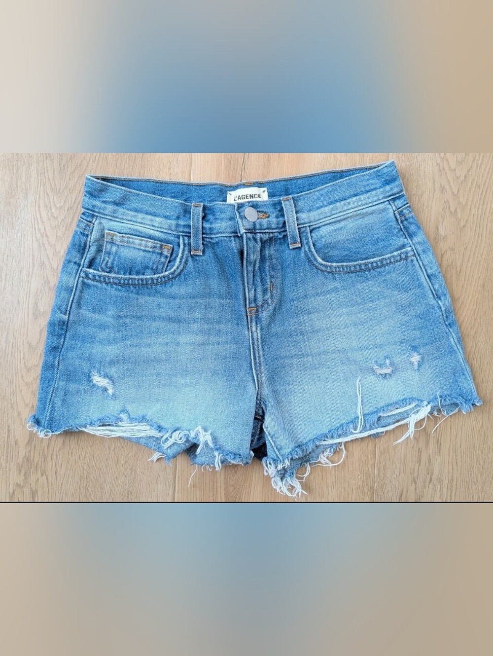 L'AGENCE Audrey Mid Rise Medium Wash Cutoff Denim Shorts